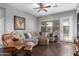 Relaxing living room, featuring a large sectional sofa and stunning artwork at 3959 E Gemini Pl, Chandler, AZ 85249