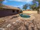 Relaxing backyard oasis featuring a kidney-shaped pool at 4225 N 92Nd Ln, Phoenix, AZ 85037