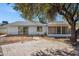 Backyard view showcasing patio and house exterior at 4242 E Sacaton St, Phoenix, AZ 85044