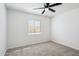 Well-lit bedroom with carpet and window coverings at 4242 E Sacaton St, Phoenix, AZ 85044