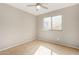 Well-lit bedroom with a window and ceiling fan at 432 E Harrison St, Chandler, AZ 85225