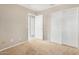 Simple bedroom with neutral walls and carpet at 432 E Harrison St, Chandler, AZ 85225