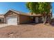 One-story house with a white garage door and desert landscaping at 432 E Harrison St, Chandler, AZ 85225