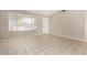 Living room with tile floors and neutral walls at 432 E Harrison St, Chandler, AZ 85225