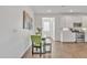 Bright dining area with light wood table and green chairs at 463 W Pinnacle Ridge Dr, San Tan Valley, AZ 85140