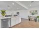 Modern kitchen island with seating and stainless steel appliances at 463 W Pinnacle Ridge Dr, San Tan Valley, AZ 85140