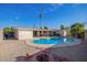 Inviting kidney-shaped pool with patio and firepit at 466 E 10Th Pl, Mesa, AZ 85203