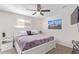 Bedroom with king-size bed, nightstand and artwork at 466 E 10Th Pl, Mesa, AZ 85203