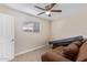 Small bedroom with a couch and plenty of space for storage at 466 E 10Th Pl, Mesa, AZ 85203