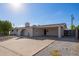 Front view of single story home with carport at 466 E 10Th Pl, Mesa, AZ 85203