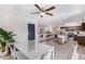 Modern kitchen with white cabinetry and breakfast bar at 466 E 10Th Pl, Mesa, AZ 85203