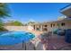 Inviting pool with patio furniture and backyard access at 466 E 10Th Pl, Mesa, AZ 85203