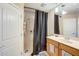 Bathroom with shower/tub combo and wood vanity at 4678 E Jadeite Dr, San Tan Valley, AZ 85143