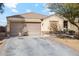 Front view of a single story house with a two-car garage at 4678 E Jadeite Dr, San Tan Valley, AZ 85143