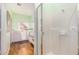 Bathroom with a walk-in shower and a bathtub at 46827 N 8Th Ave, New River, AZ 85087