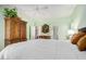 Bedroom featuring carpet flooring, a ceiling fan, and a walk-in closet at 46827 N 8Th Ave, New River, AZ 85087