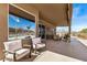 Covered patio showcasing outdoor seating, overlooking pool at 46827 N 8Th Ave, New River, AZ 85087