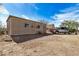 Property featuring large storage shed and gravel landscaping, providing ample space for parking and storage at 46827 N 8Th Ave, New River, AZ 85087