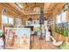 Bright studio with hardwood floors filled with unique paintings at 46827 N 8Th Ave, New River, AZ 85087