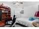 Bedroom featuring a full-size bed and home office at 481 W Ivanhoe Pl, Chandler, AZ 85225