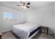 Well-lit bedroom with a queen-size bed at 481 W Ivanhoe Pl, Chandler, AZ 85225