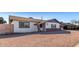 Ranch style home with a brick facade and gravel driveway at 481 W Ivanhoe Pl, Chandler, AZ 85225