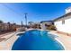 Relaxing kidney-shaped pool with ample surrounding patio space at 481 W Ivanhoe Pl, Chandler, AZ 85225