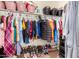 Spacious walk-in closet with ample hanging space and shelving at 4908 S 244Th Ave, Buckeye, AZ 85326