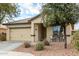 Charming one-story home with a two-car garage and well-maintained landscaping at 4908 S 244Th Ave, Buckeye, AZ 85326