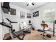 Well-equipped home gym featuring treadmill, stationary bike, and weights at 4908 S 244Th Ave, Buckeye, AZ 85326