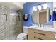 Stylish bathroom with a walk-in shower and updated fixtures at 530 E Calavar Rd, Phoenix, AZ 85022