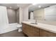 Clean bathroom with tub, shower, and modern vanity at 535 W Thomas Rd # 213, Phoenix, AZ 85013