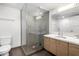 Updated bathroom with a glass shower and modern vanity at 535 W Thomas Rd # 213, Phoenix, AZ 85013