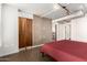 Spacious bedroom with a large bed and built-in closet at 535 W Thomas Rd # 213, Phoenix, AZ 85013