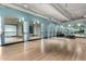 Bright studio with wood floors, mirrors, and ballet barre at 535 W Thomas Rd # 213, Phoenix, AZ 85013