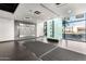 Modern building lobby with water feature and seating at 535 W Thomas Rd # 213, Phoenix, AZ 85013