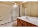 Clean bathroom with tub, shower, and wood vanity at 5450 E Deer Valley Dr # 1204, Phoenix, AZ 85054