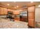 Modern kitchen with stainless steel appliances and granite at 5450 E Deer Valley Dr # 1204, Phoenix, AZ 85054