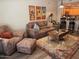 Living room with brown leather furniture and southwestern decor at 5450 E Deer Valley Dr # 1204, Phoenix, AZ 85054