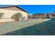 Large backyard with grassy area, pool, and storage shed at 6016 N 36Th Dr, Phoenix, AZ 85019