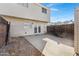 Private backyard with patio and double doors at 6415 S El Camino Dr, Tempe, AZ 85283