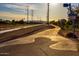 Paved pathway alongside a canal, with a bakery and cafe nearby at 6415 S El Camino Dr, Tempe, AZ 85283