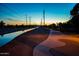 Evening view of a canal-side paved pathway, ideal for walking or biking at 6415 S El Camino Dr, Tempe, AZ 85283