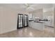 Kitchen with white cabinets, a breakfast bar, and tile flooring at 6415 S El Camino Dr, Tempe, AZ 85283