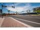 Street view of light rail passing intersection with traffic signals at 6415 S El Camino Dr, Tempe, AZ 85283