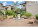 Relaxing courtyard with fountain and wooden benches at 6565 E Thomas Rd # 1141, Scottsdale, AZ 85251