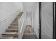 Interior entryway with wooden stairs and hardwood floors at 6565 E Thomas Rd # 1141, Scottsdale, AZ 85251