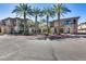 Front view of building with palm trees and parking at 6565 E Thomas Rd # 1141, Scottsdale, AZ 85251