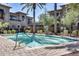 Community swimming pool with a teal colored tile at 6565 E Thomas Rd # 1141, Scottsdale, AZ 85251