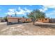 Large backyard with storage shed and desert landscaping at 6730 W Vernon Ave, Phoenix, AZ 85035